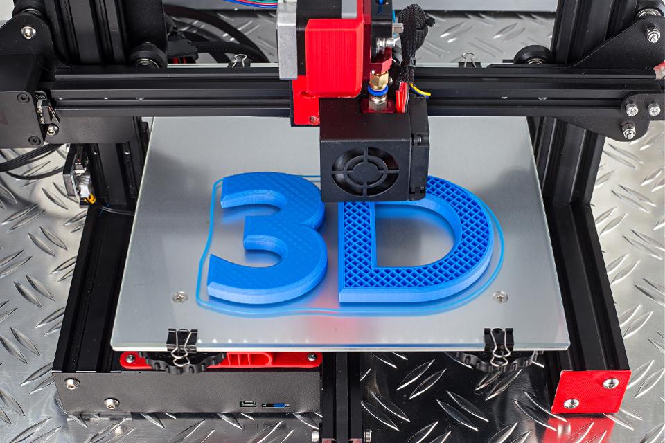 How does the pioneering multi-material 3D printer streamline complex device creation?